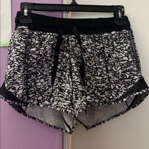 Lulu Lemon size 4 tall reflective mesh shorts